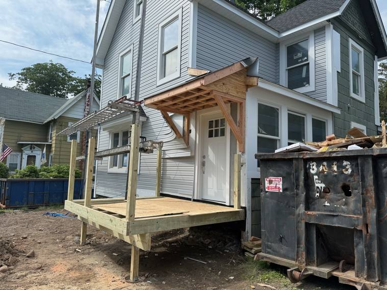 New rear porch framing with roof