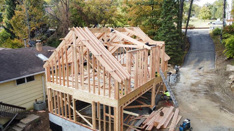 Second-story addition with gable roof framing