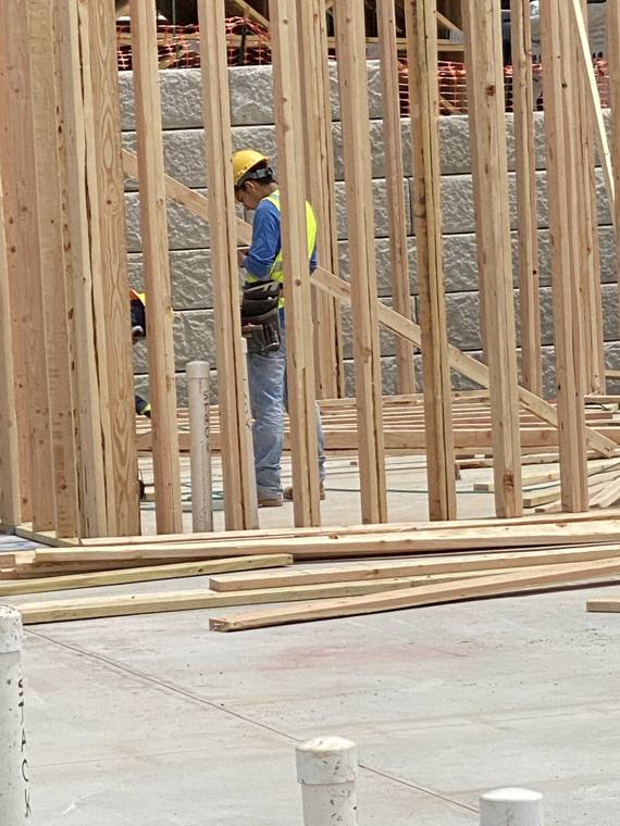 Framer working between new stud walls